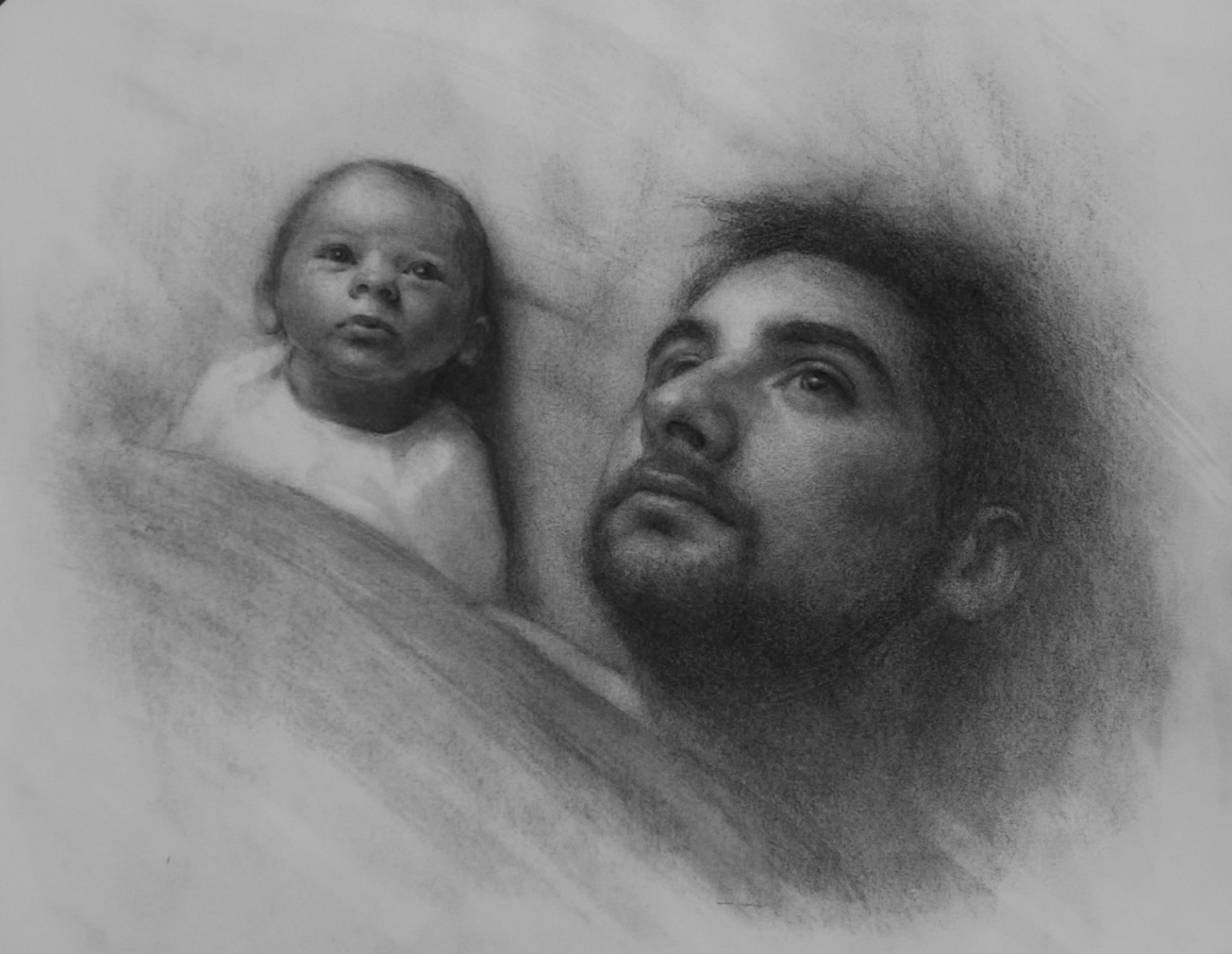 Graphite portrait of a young woman with loosely gathered hair