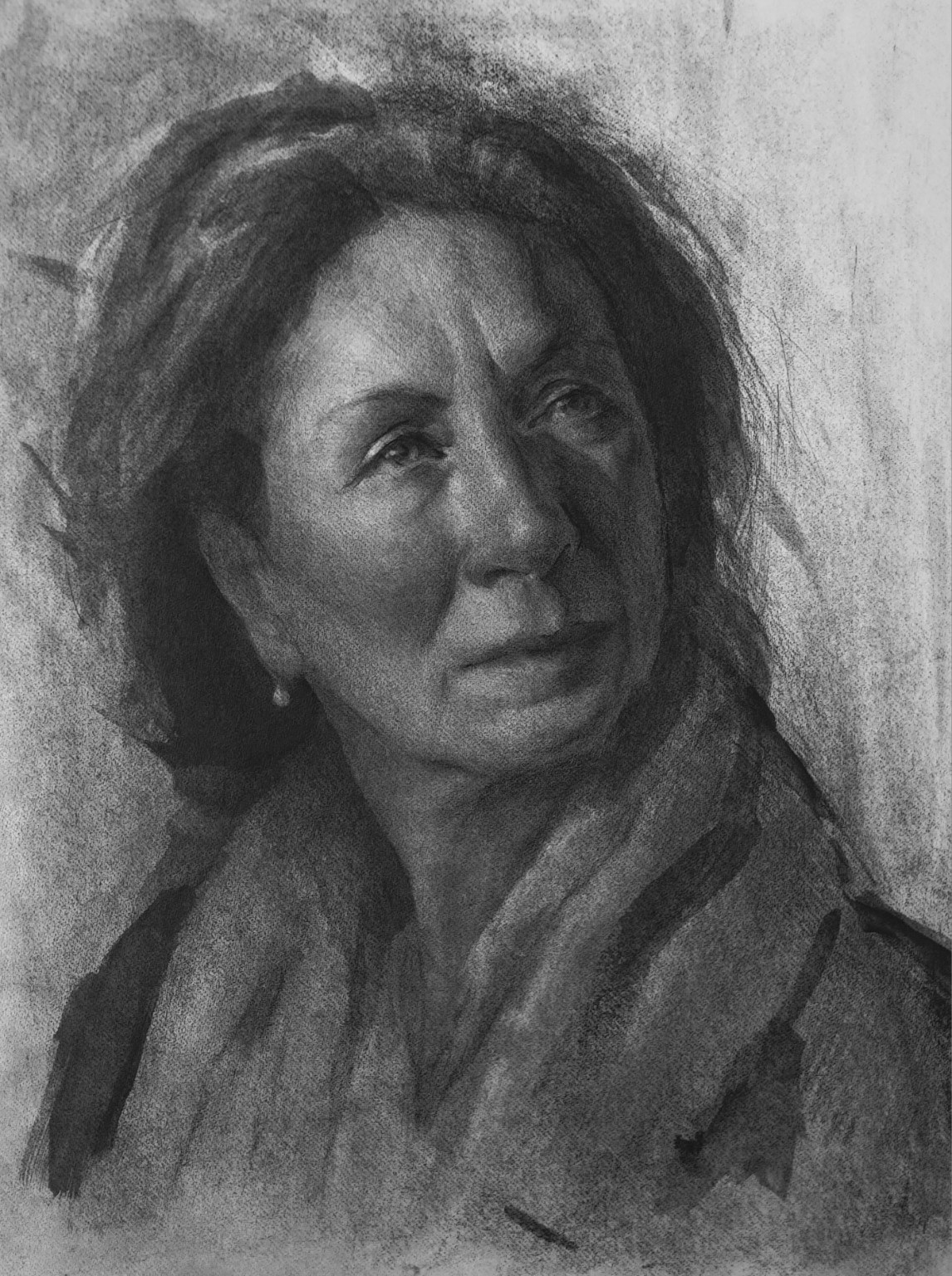 Graphite portrait of a woman wearing a scarf