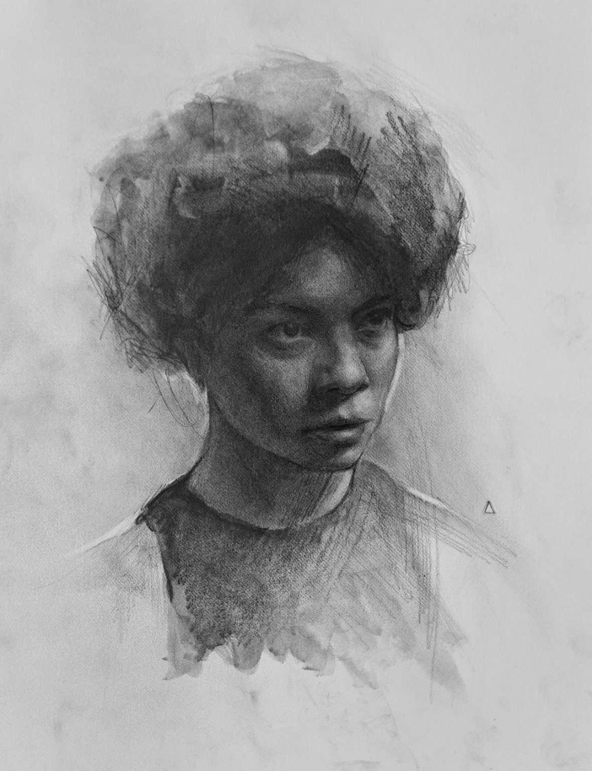 Graphite portrait of a woman looking to the side